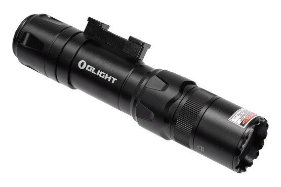 Odin GL Mini 1000 Lumen Compact Rail Mount Flashlight with Green Laser has a mode selector ring on the light head.